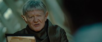 Movie still from “Star Trek” (2009), directed by J.J. Abrams – An older man with a gray hair and a gray jacket; Close Up shot, Over the shoulder angle