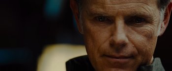 Movie still from “Star Trek” (2009), directed by J.J. Abrams – A man's face in a black shirt; Extreme Close Up shot, Over the shoulder angle