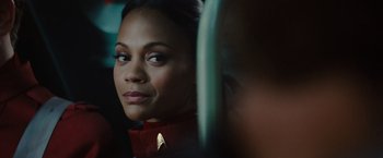 Movie still from “Star Trek” (2009), directed by J.J. Abrams – An image of a star trek character; Close Up shot, Over the shoulder angle