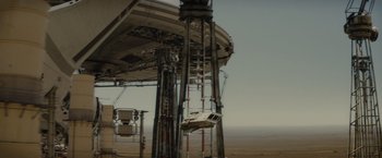 Movie still from “Star Trek” (2009), directed by J.J. Abrams – An upside down car hanging off the side of a building; Extreme Wide shot, Low angle