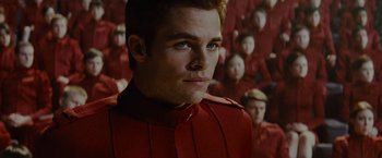 Movie still from “Star Trek” (2009), directed by J.J. Abrams – A person wearing a red uniform; Close Up shot, Over the shoulder angle