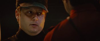 Movie still from “Star Trek” (2009), directed by J.J. Abrams – A person wearing a hat; Close Up shot, Over the shoulder angle