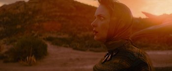 Movie still from “Star Trek” (2009), directed by J.J. Abrams – A woman with a headscarf looking into the distance; Close Up shot, Low angle