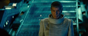Movie still from “Star Trek” (2009), directed by J.J. Abrams – A man in a space suit standing in front of a staircase; Close Up shot, Over the shoulder angle