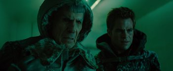 Movie still from “Star Trek” (2009), directed by J.J. Abrams – A man and a woman wearing fur coats and hats; Close Up shot, Over the shoulder angle