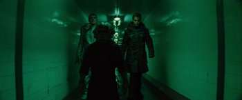 Movie still from “Star Trek” (2009), directed by J.J. Abrams – A group of people walking down a dark hallway; Medium shot, Low angle