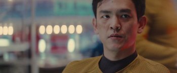 Movie still from “Star Trek” (2009), directed by J.J. Abrams – A person wearing a yellow shirt; Close Up shot, Low angle
