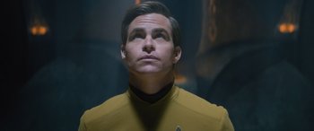 Movie still from “Star Trek Beyond” (2016), directed by Justin Lin – A person wearing a yellow shirt; Close Up shot, Low angle