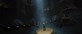 Movie still from “Star Trek Beyond” (2016), directed by Justin Lin – A man standing on top of a tree stump; Extreme Wide shot, High angle