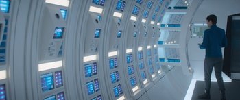 Movie still from “Star Trek Beyond” (2016), directed by Justin Lin – A room with a lot of screens on the wall; Extreme Wide shot, Overhead angle