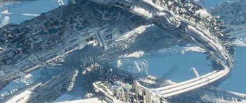 Movie still from “Star Trek Beyond” (2016), directed by Justin Lin – An aerial view of a large city with buildings; Extreme Wide shot, Overhead angle