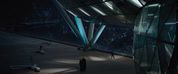 Movie still from “Star Trek Beyond” (2016), directed by Justin Lin – Two people are standing in a dark room; Extreme Wide shot, Overhead angle