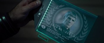 Movie still from “Star Trek Beyond” (2016), directed by Justin Lin – A person is holding an electronic device in their hand; Extreme Close Up shot, Over the shoulder angle