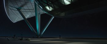 Movie still from “Star Trek Beyond” (2016), directed by Justin Lin – A person standing under a large structure at night; Extreme Wide shot, Low angle