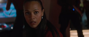 Movie still from “Star Trek Beyond” (2016), directed by Justin Lin – A person with long black hair; Close Up shot, High angle