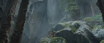Movie still from “Star Trek Beyond” (2016), directed by Justin Lin – A group of people sitting on top of a rock formation; Extreme Wide shot, High angle