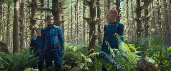 Movie still from “Star Trek Beyond” (2016), directed by Justin Lin – Two people in a forest with trees and bushes; Medium shot, Over the shoulder angle