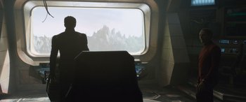 Movie still from “Star Trek Beyond” (2016), directed by Justin Lin – A man sitting on a train looking out of a window; Wide shot, Over the shoulder angle