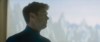Movie still from “Star Trek Beyond” (2016), directed by Justin Lin – A person looking out of a window; Close Up shot, Over the shoulder angle