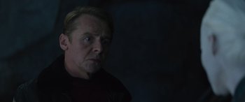 Movie still from “Star Trek Beyond” (2016), directed by Justin Lin – A man in a dark room looking at the camera; Close Up shot, Over the shoulder angle