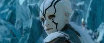 Movie still from “Star Trek Beyond” (2016), directed by Justin Lin – A person with a face paint on; Close Up shot, Over the shoulder angle
