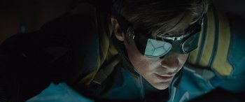 Movie still from “Star Trek Beyond” (2016), directed by Justin Lin – A man wearing a pair of sunglasses looking down at his face; Close Up shot, Low angle