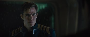 Movie still from “Star Trek Beyond” (2016), directed by Justin Lin – A person wearing a jacket; Close Up shot, Over the shoulder angle