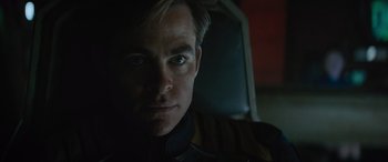 Movie still from “Star Trek Beyond” (2016), directed by Justin Lin – A man's face in the dark; Close Up shot, Over the shoulder angle