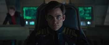 Movie still from “Star Trek Beyond” (2016), directed by Justin Lin – A person wearing a suit and tie; Close Up shot, Low angle