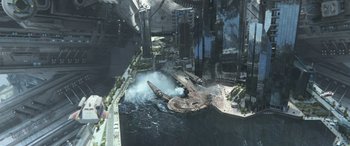 Movie still from “Star Trek Beyond” (2016), directed by Justin Lin – An aerial view of a city with a large body of water; Extreme Wide shot, Overhead angle