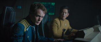 Movie still from “Star Trek Beyond” (2016), directed by Justin Lin – Two men sitting at a computer in a dark room; Close Up shot, Over the shoulder angle