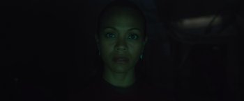 Movie still from “Star Trek Beyond” (2016), directed by Justin Lin – A woman with blue eyes stares into the dark; Close Up shot, Low angle