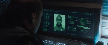 Movie still from “Star Trek Beyond” (2016), directed by Justin Lin – A man sitting in front of a computer screen; Close Up shot, Over the shoulder angle