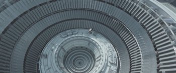 Movie still from “Star Trek Beyond” (2016), directed by Justin Lin – A man standing inside of a circular building; Extreme Wide shot, Overhead angle