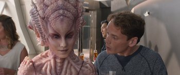 Movie still from “Star Trek Beyond” (2016), directed by Justin Lin – A man and a woman are sitting at a table; Close Up shot, Over the shoulder angle