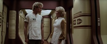 Movie still from “Star Trek II: The Wrath of Khan” (1982), directed by Nicholas Meyer – A man and a woman standing next to each other; Medium shot, Over the shoulder angle