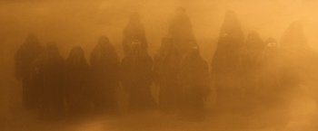 Movie still from “Star Trek II: The Wrath of Khan” (1982), directed by Nicholas Meyer – A group of people standing in the sand; Wide shot, Low angle