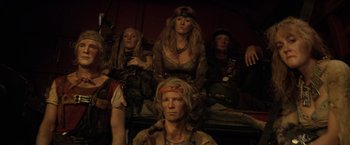 Movie still from “Star Trek II: The Wrath of Khan” (1982), directed by Nicholas Meyer – A group of people sitting on top of a bed; Medium shot, High angle