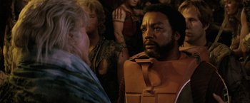 Movie still from “Star Trek II: The Wrath of Khan” (1982), directed by Nicholas Meyer – A group of people standing next to each other in a room; Close Up shot, Over the shoulder angle