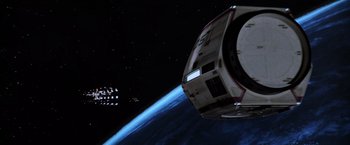 Movie still from “Star Trek II: The Wrath of Khan” (1982), directed by Nicholas Meyer – An image of a space station in the space; Extreme Wide shot, Overhead angle