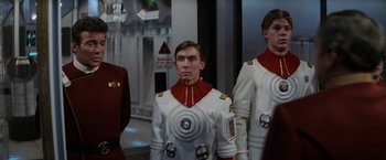Movie still from “Star Trek II: The Wrath of Khan” (1982), directed by Nicholas Meyer – A group of men in space suits standing next to each other; Medium shot, Low angle