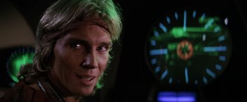 Movie still from “Star Trek II: The Wrath of Khan” (1982), directed by Nicholas Meyer – A person in a room near a clock; Close Up shot, Low angle