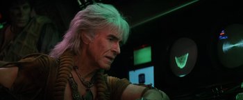 Movie still from “Star Trek II: The Wrath of Khan” (1982), directed by Nicholas Meyer – A person wearing a costume; Close Up shot, Over the shoulder angle