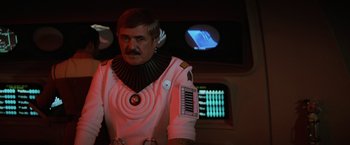 Movie still from “Star Trek II: The Wrath of Khan” (1982), directed by Nicholas Meyer – A man dressed in a white space suit; Medium shot, Low angle