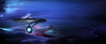 Movie still from “Star Trek II: The Wrath of Khan” (1982), directed by Nicholas Meyer – A star trek ship flying through the air; Extreme Wide shot, Low angle