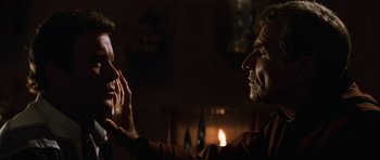 Movie still from “Star Trek III: The Search for Spock” (1984), directed by Leonard Nimoy – Two men talking in front of a fireplace; Close Up shot, Over the shoulder angle