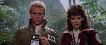 Movie still from “Star Trek III: The Search for Spock” (1984), directed by Leonard Nimoy – A man and a woman are holding a remote control; Close Up shot, Low angle