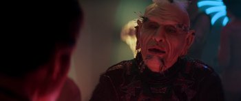 Movie still from “Star Trek III: The Search for Spock” (1984), directed by Leonard Nimoy – An old man with a beard and a wig is talking to a young man; Close Up shot, Over the shoulder angle