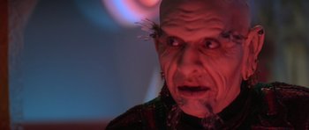 Movie still from “Star Trek III: The Search for Spock” (1984), directed by Leonard Nimoy – An old man with a strange look on his face; Close Up shot, Over the shoulder angle