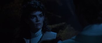 Movie still from “Star Trek III: The Search for Spock” (1984), directed by Leonard Nimoy – A woman in a white shirt and a black jacket; Close Up shot, Over the shoulder angle